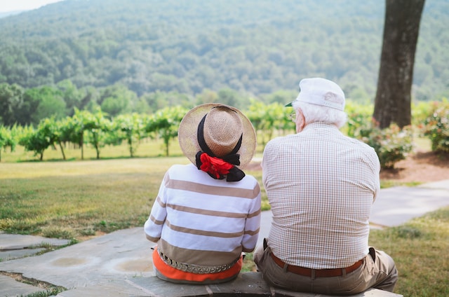 Elderly couple sitting on their porch