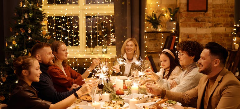 A family celebrating Christmas and having dinner.